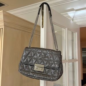 Michael Kors handbag with adjustable strap.New